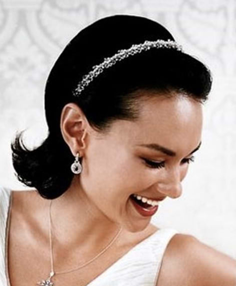 bride with headband and backcombed flipped hair