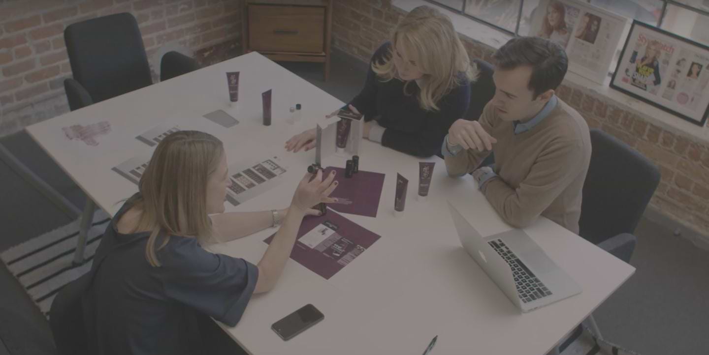 Employees working at desk