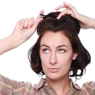 take half moon section and curl under towards face