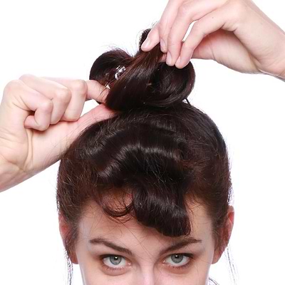 Take the rest of hair and repeat tying at the top of that section