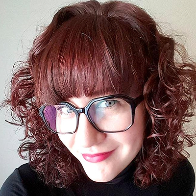 redhead with glasses