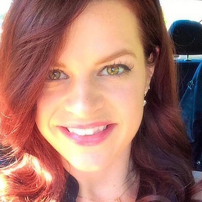 Smiling woman with red hair