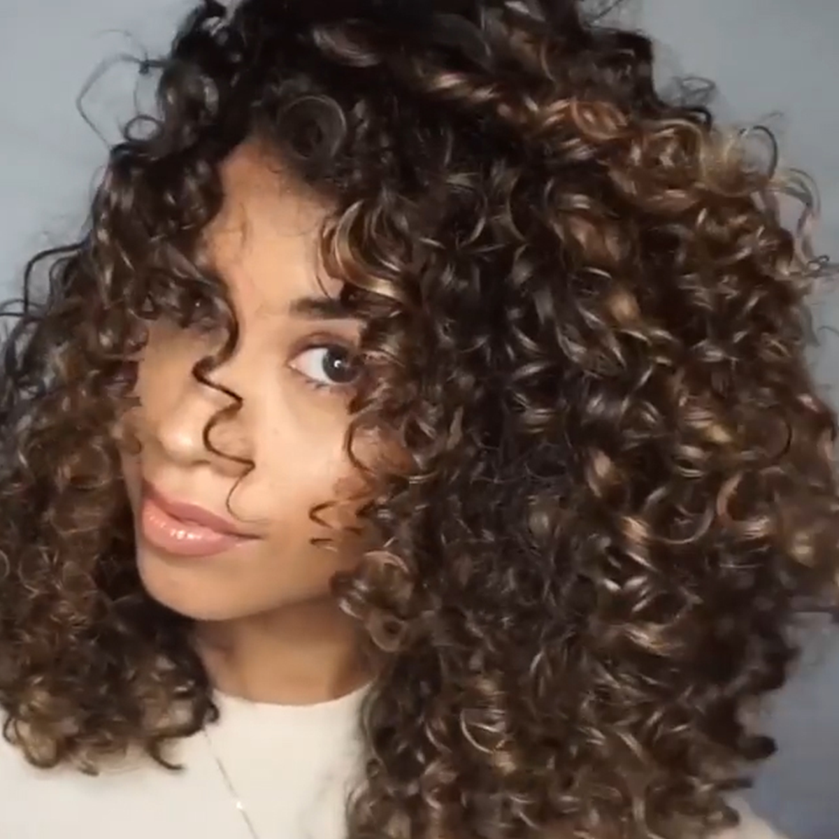 Bricia with toffee balayage highlighting