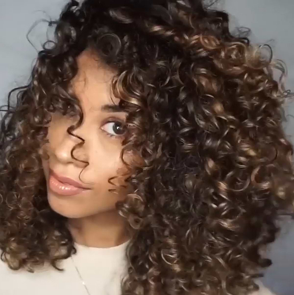 Bricia with toffee balayage highlighting