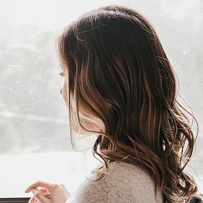 lowlights hairstyle on woman Woman with low maintenance summer hair color