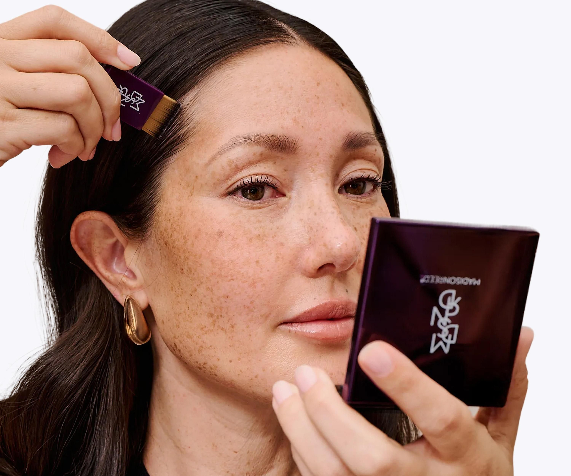 brown hair applying root touch up powder for instant gray coverage