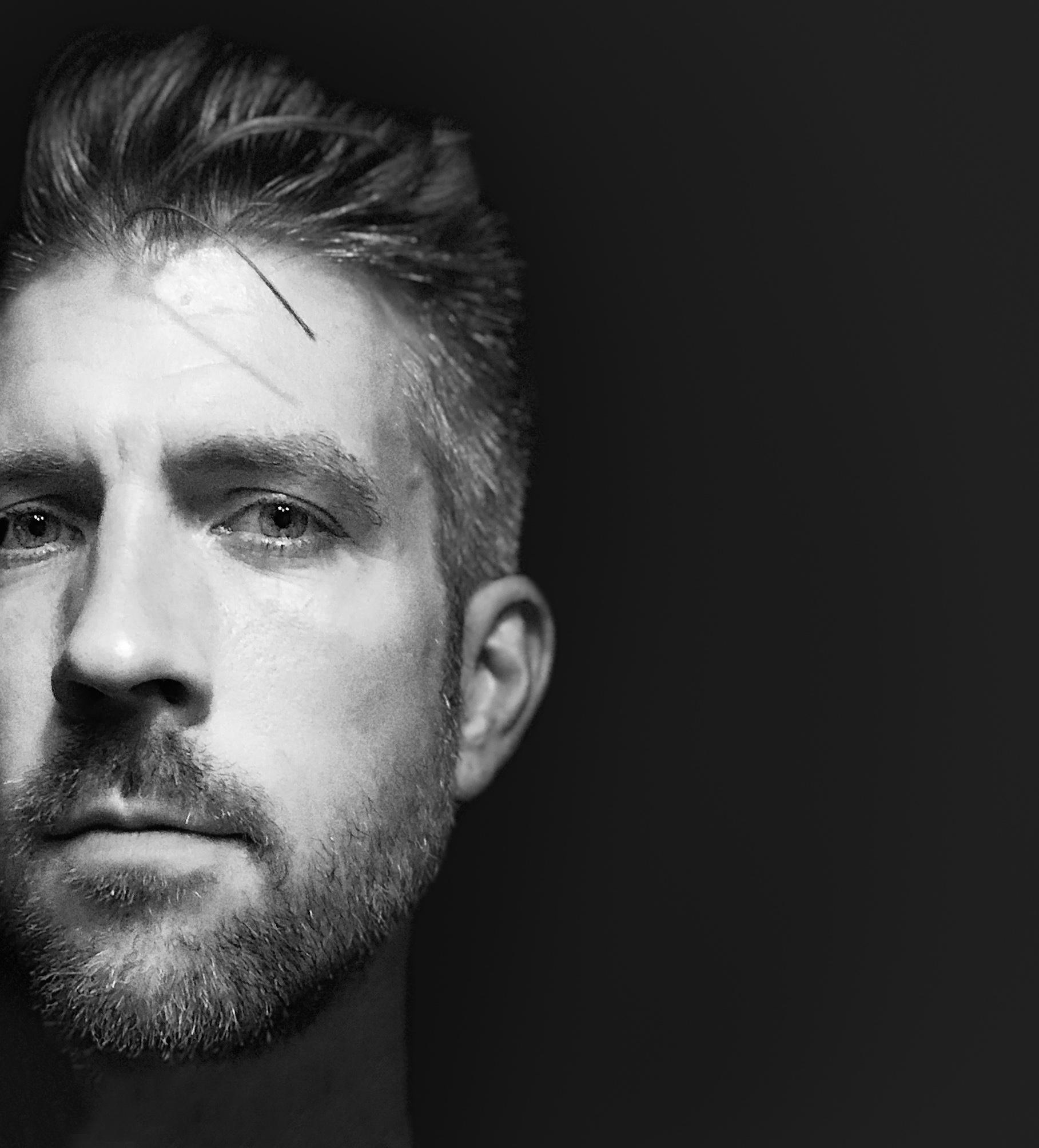 male model displaying Madison Reed Mister hair and beard coloring