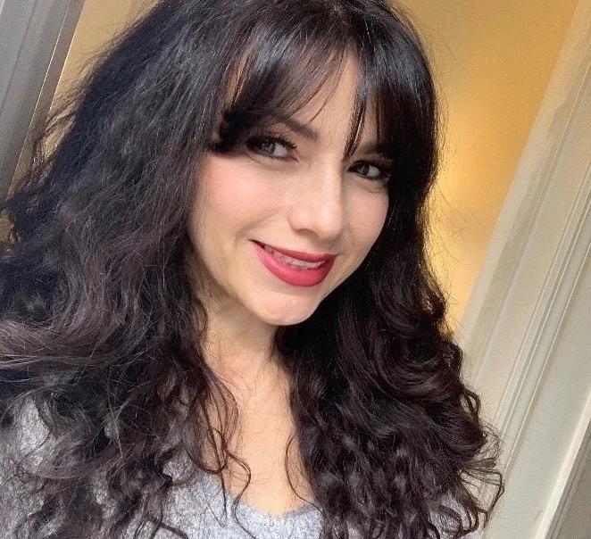 woman with black wavy hair